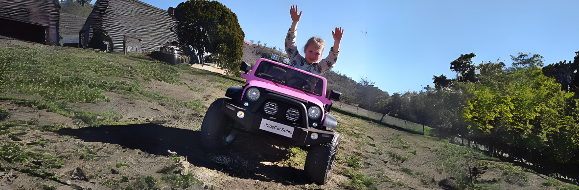 happy-kid-playing-in-a-backyard-on-her-ride-on-car