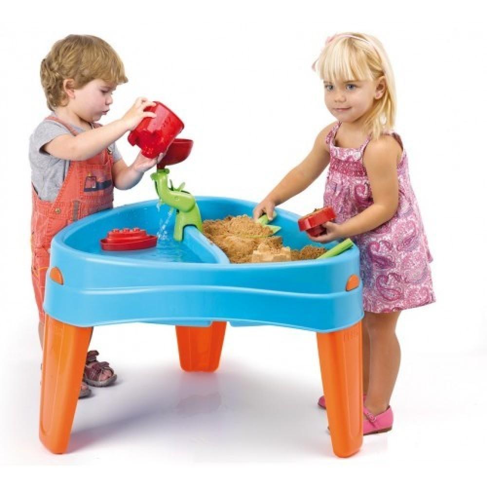 young boy and girl playing with sand and water toy