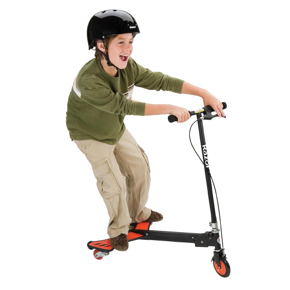 boy with black helmet riding a razor wing scooter