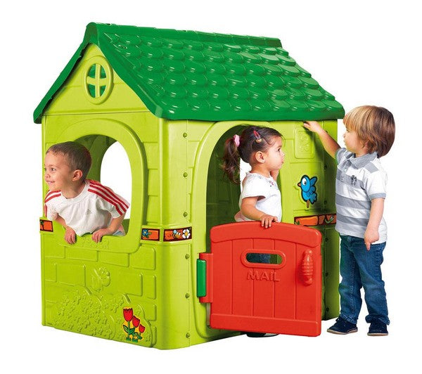 three kids playing in a cubby house
