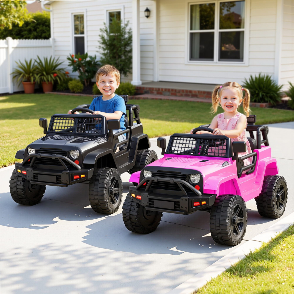 Two children playing with a black toy car and a pink toy car on a driveway.