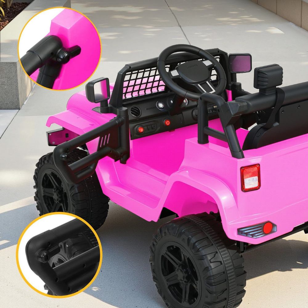 A bright pink children's ride-on toy jeep with black wheels, steering wheel, and roll bars, shown outdoors on a paved surface. Two circular inset close-ups highlight black accessory details, including a side mirror and bumper area.