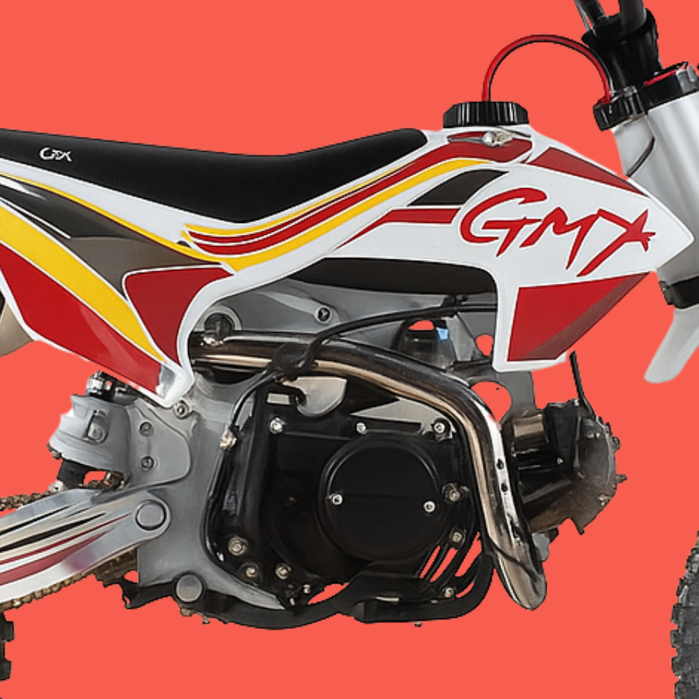 Side view close-up of the GMX 125cc dirt bike engine, frame, and fuel tank graphics reading "GMX".
