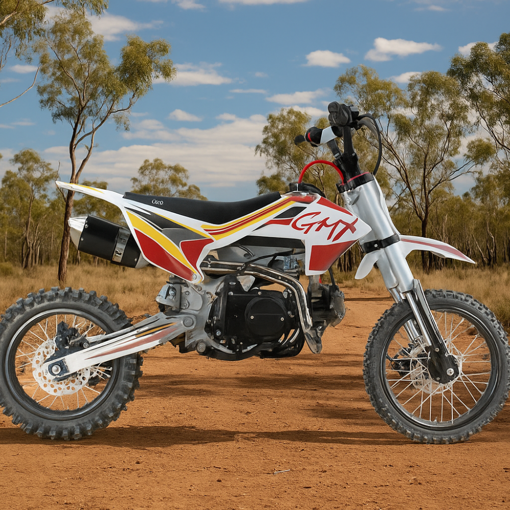 Young rider sitting confidently on the GMX 125cc dirt bike in a bushland setting under a clear blue sky.