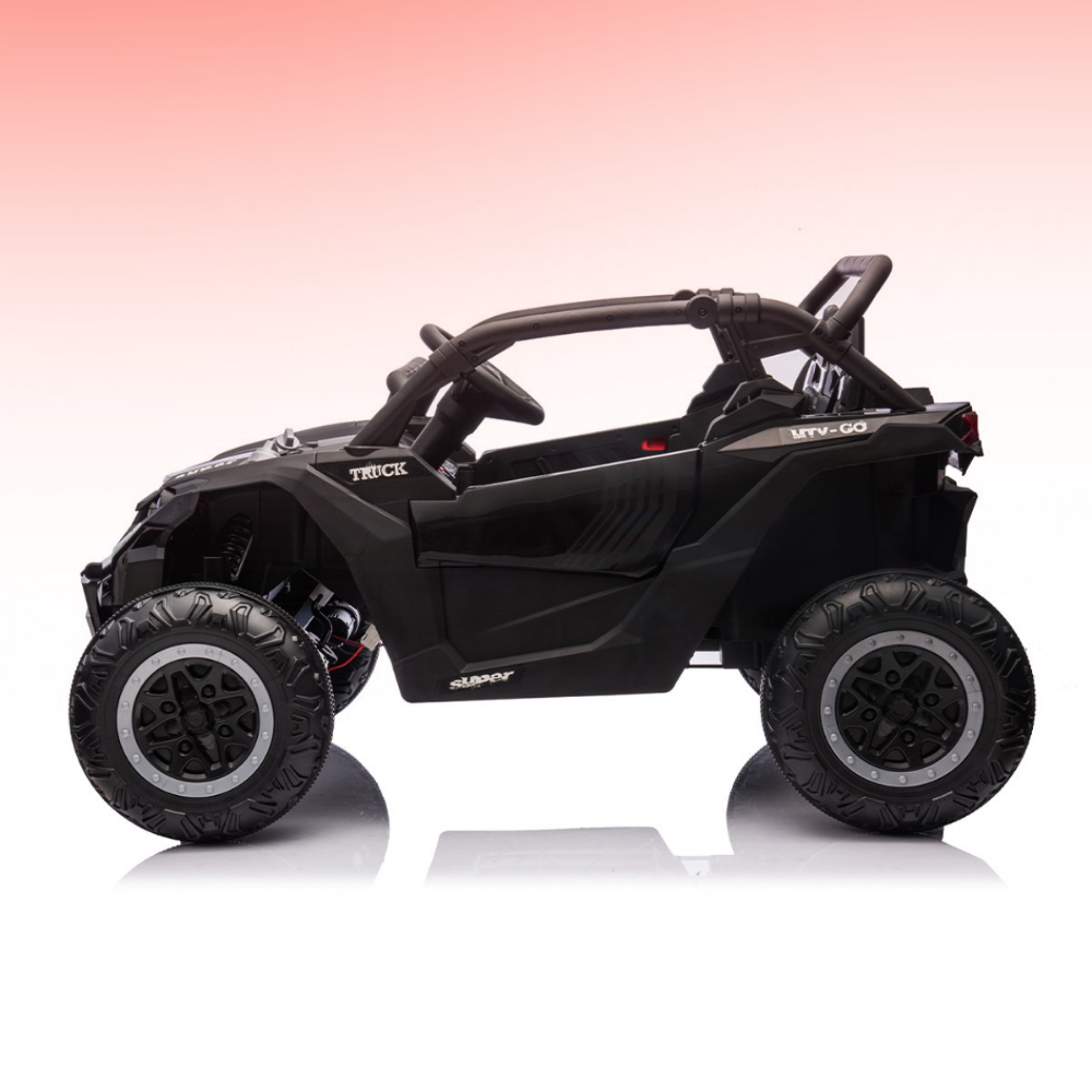 Black toy off-road vehicle on a gradient pink to white background
