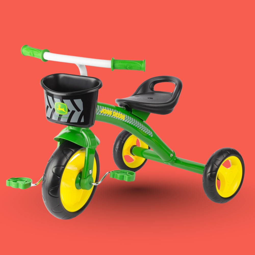 John Deere steel tricycle in green with yellow wheels, on a red background.