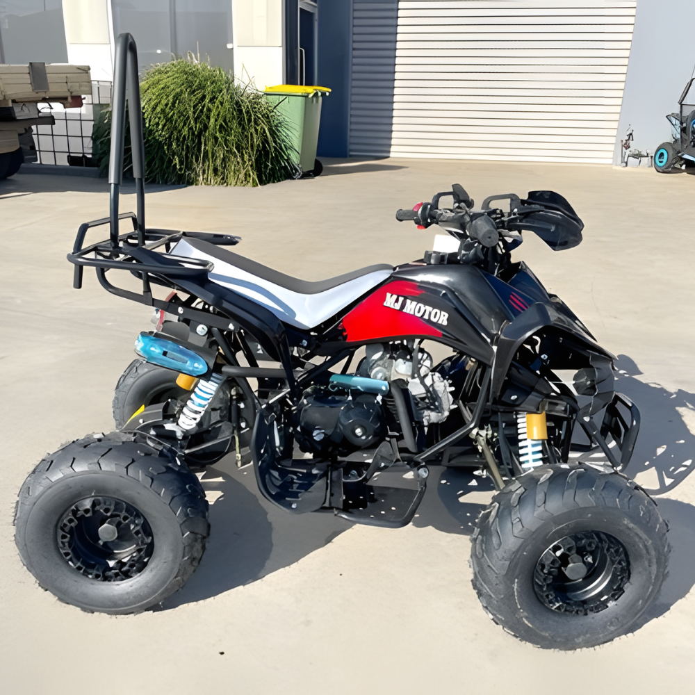 Four-wheeler ATV with 'MJ Motor' branding on a concrete surface.
