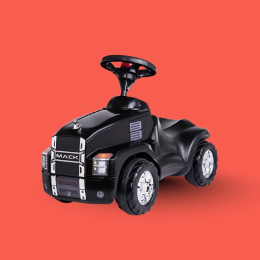 Black toy vehicle with 'Mack' branding on a red background