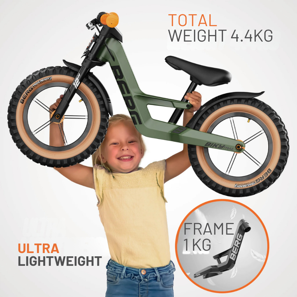 Child holding a green balance bike with text about weight and frame material.