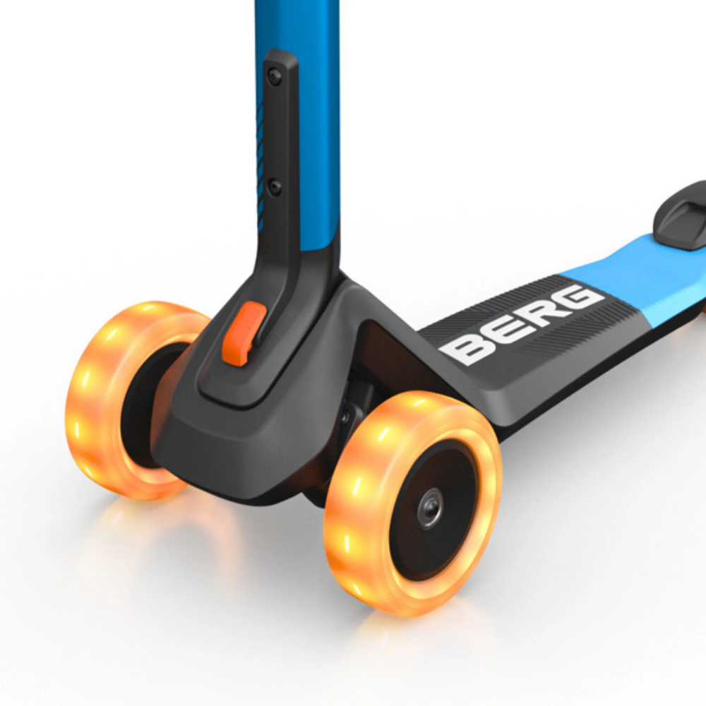 Children's scooter with orange wheels and 'BERG' branding on a white background