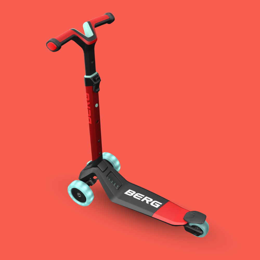 Red and black scooter with turquoise wheels on a red background