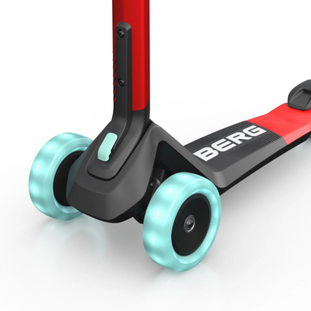 Red and black scooter with turquoise wheels on a white background