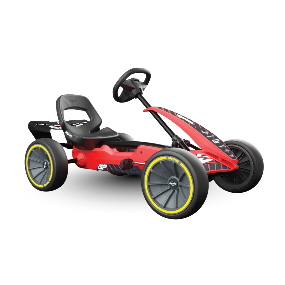 Red pedal go-kart with black seat on a white background