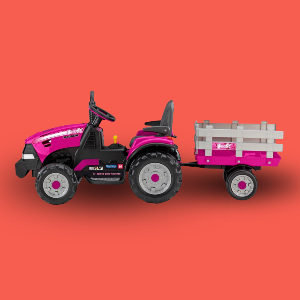 Pink toy tractor with a trailer on an orange background