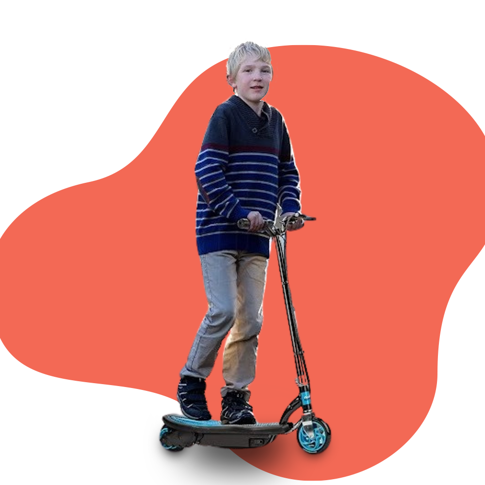 A young boy riding a black electric scooter with blue wheels, smiling and enjoying the ride, placed on a white background with a red abstract shape.