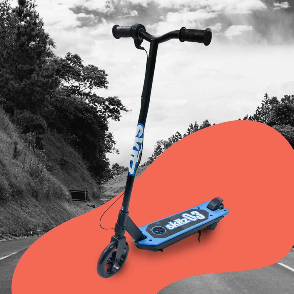 Scooter in Outdoor Setting (Black and White): A black-and-white image of the scooter in a natural environment, showcasing its versatility for different terrains.