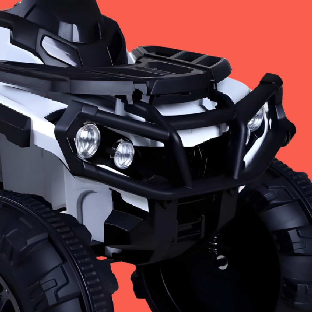 Close-up of Go Skitz Adventure Electric Kids Quad Bike with black and white design on a red background