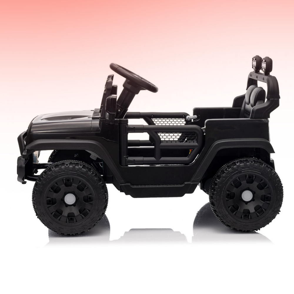 Black toy jeep on a gradient pink to white background