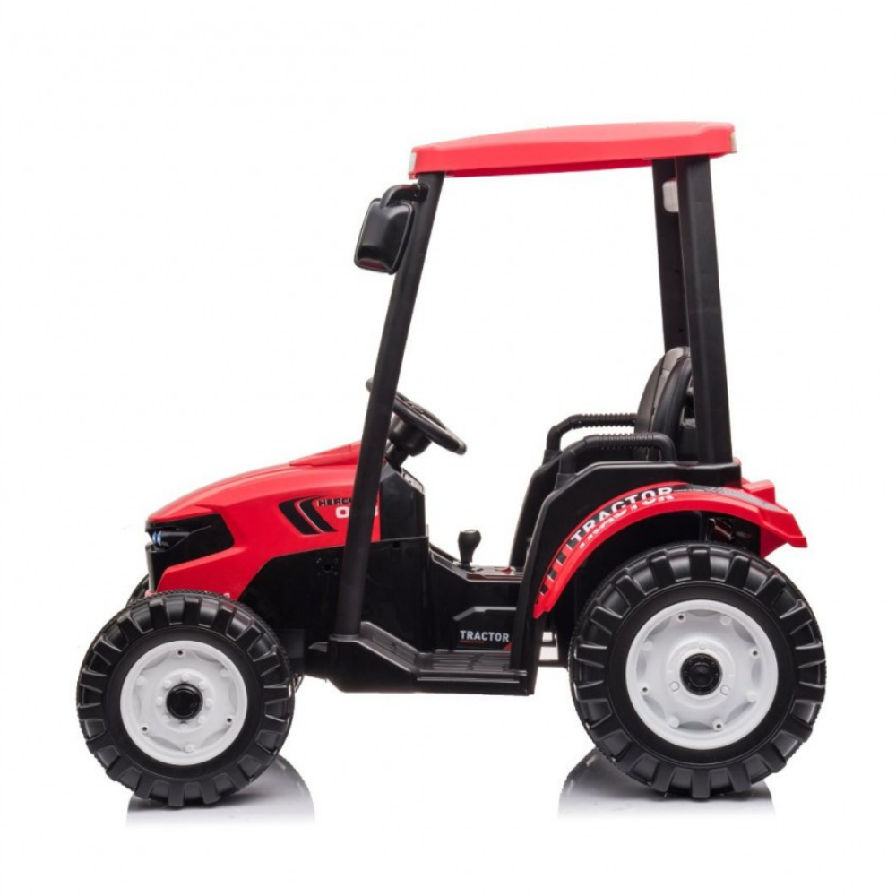 A red and black ride-on toy tractor with a small driver seat, steering wheel, and large black tires, shown from the side on a white background.