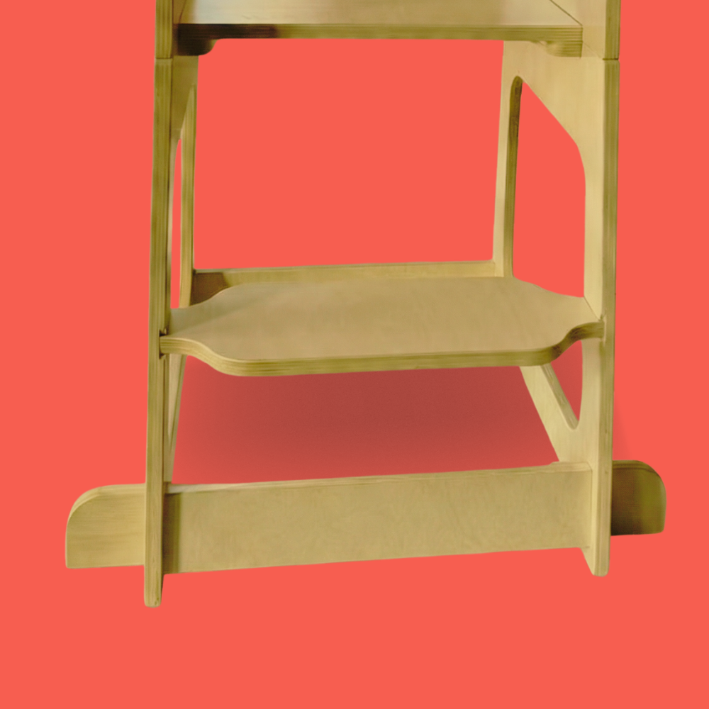 Wooden step stool on a solid red background