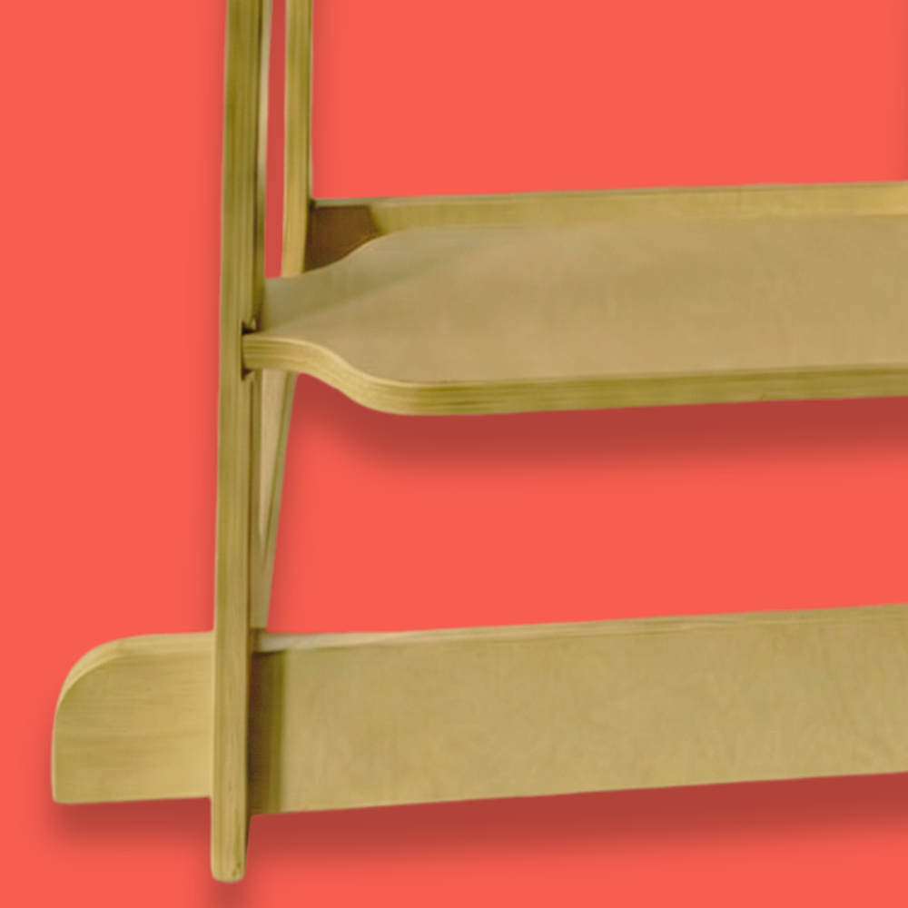 Wooden shelf against a red background