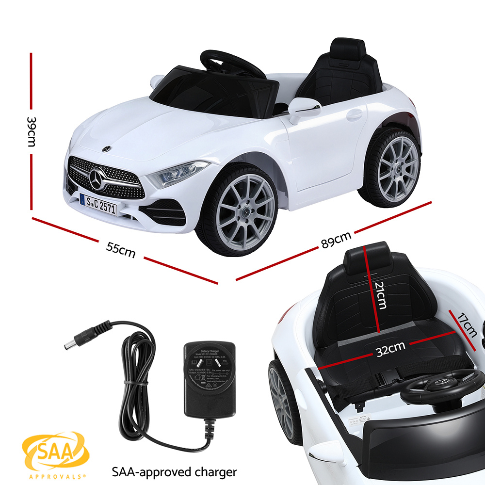 White toy car with black interior, SAA-approved charger, and measurements on a white background