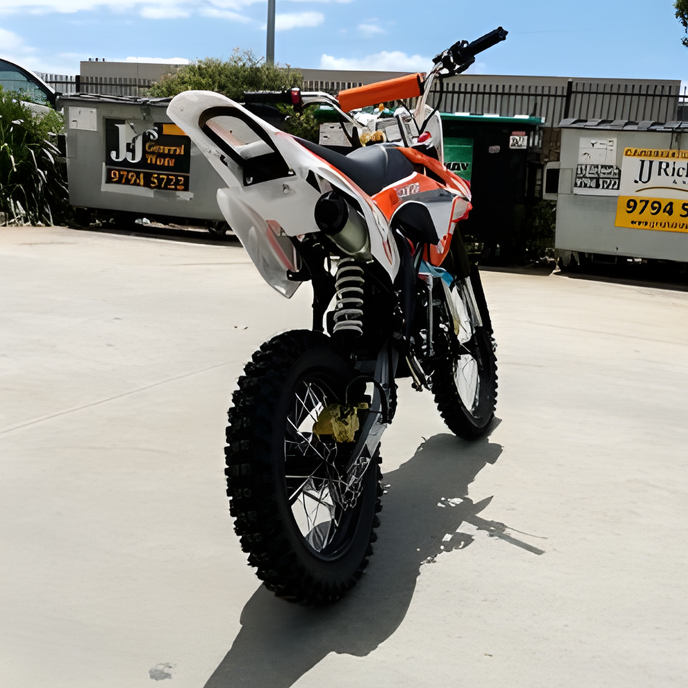 rear view of MJM 125cc Petrol Powered 4-Stroke E-Start Kids Dirt Bike - Orange