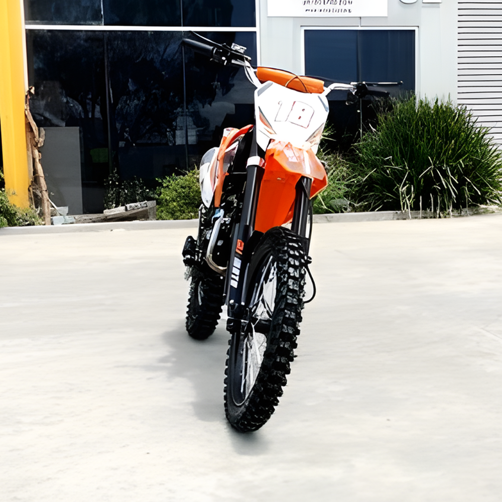 front view of MJM 125cc Petrol Powered 4-Stroke E-Start Kids Dirt Bike - Orange