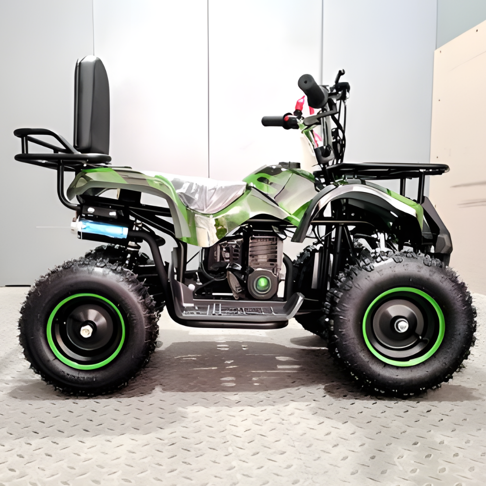 Green and black ATV on a metallic surface with a neutral background