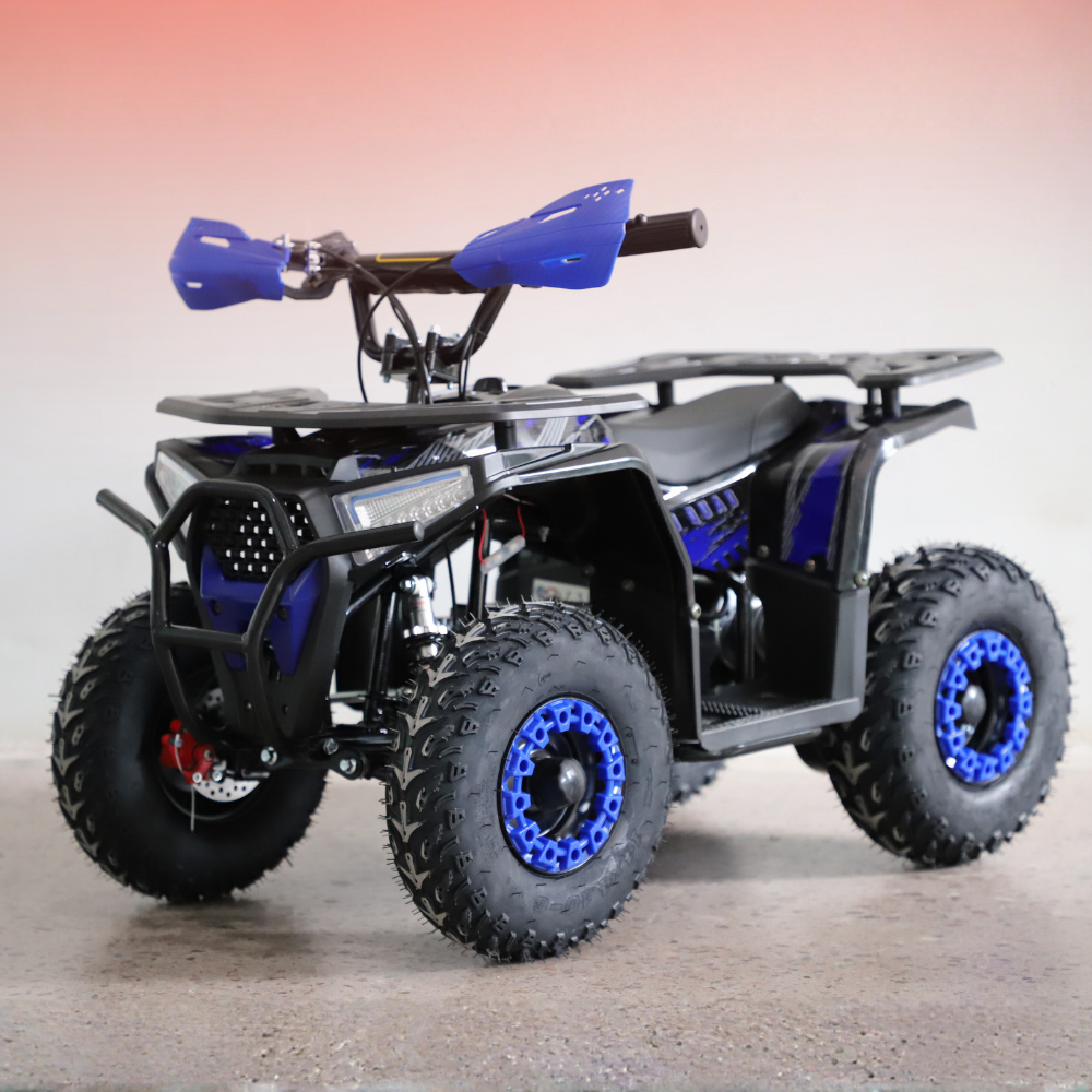Black and blue ATV on a gray background