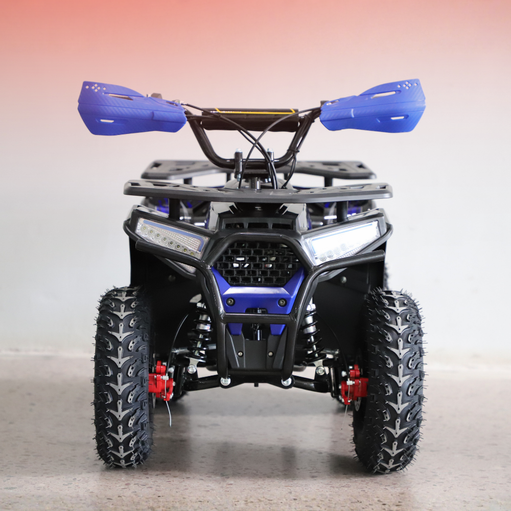 Front view of a blue and black ATV on a light background