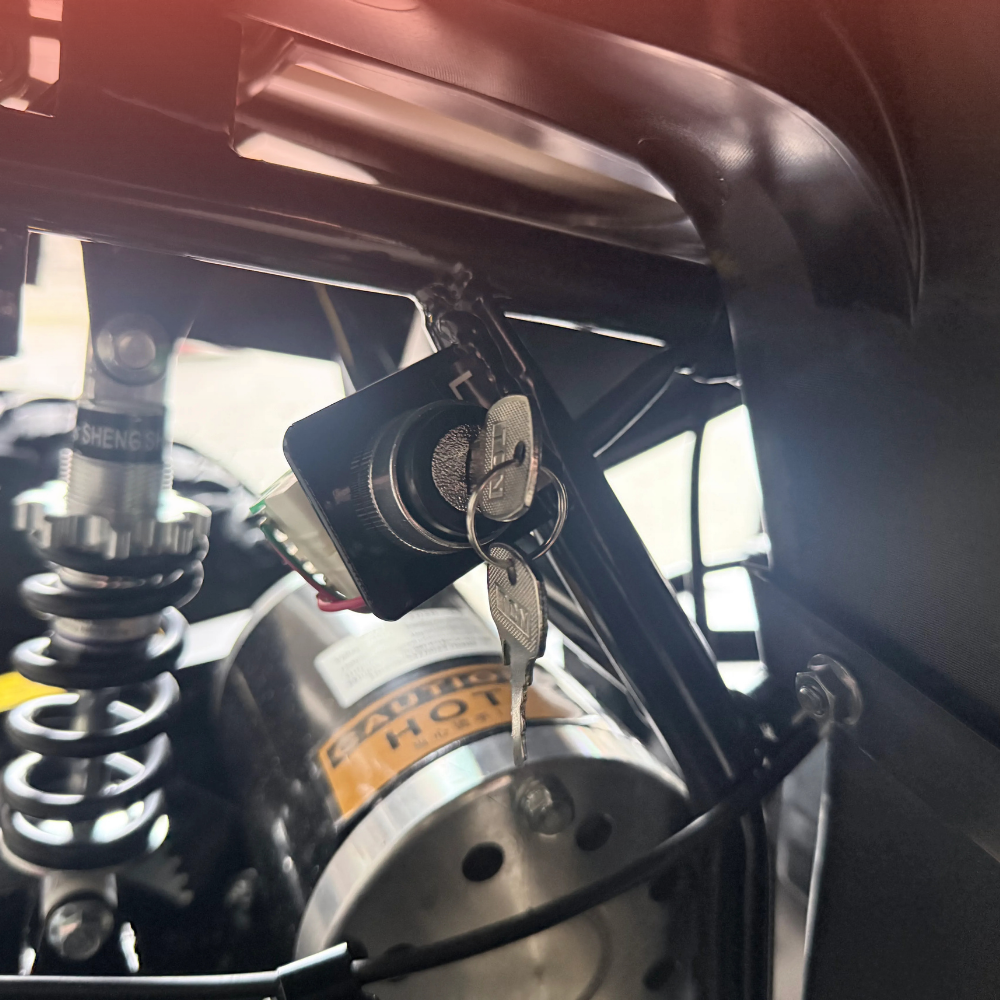 Close-up of a motorcycle suspension system with visible branding.