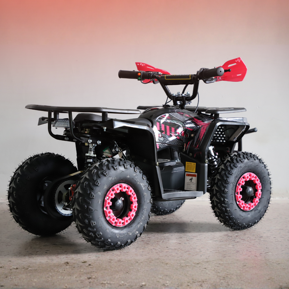 Black and red ATV with pink wheels on a gray background