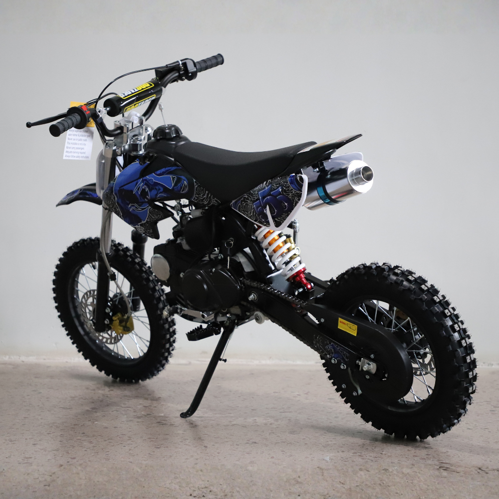 Small dirt bike on a gray background