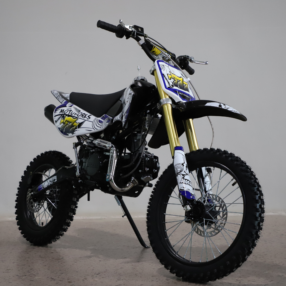 Side profile of the dirt bike facing left, shown in a neutral studio setting.