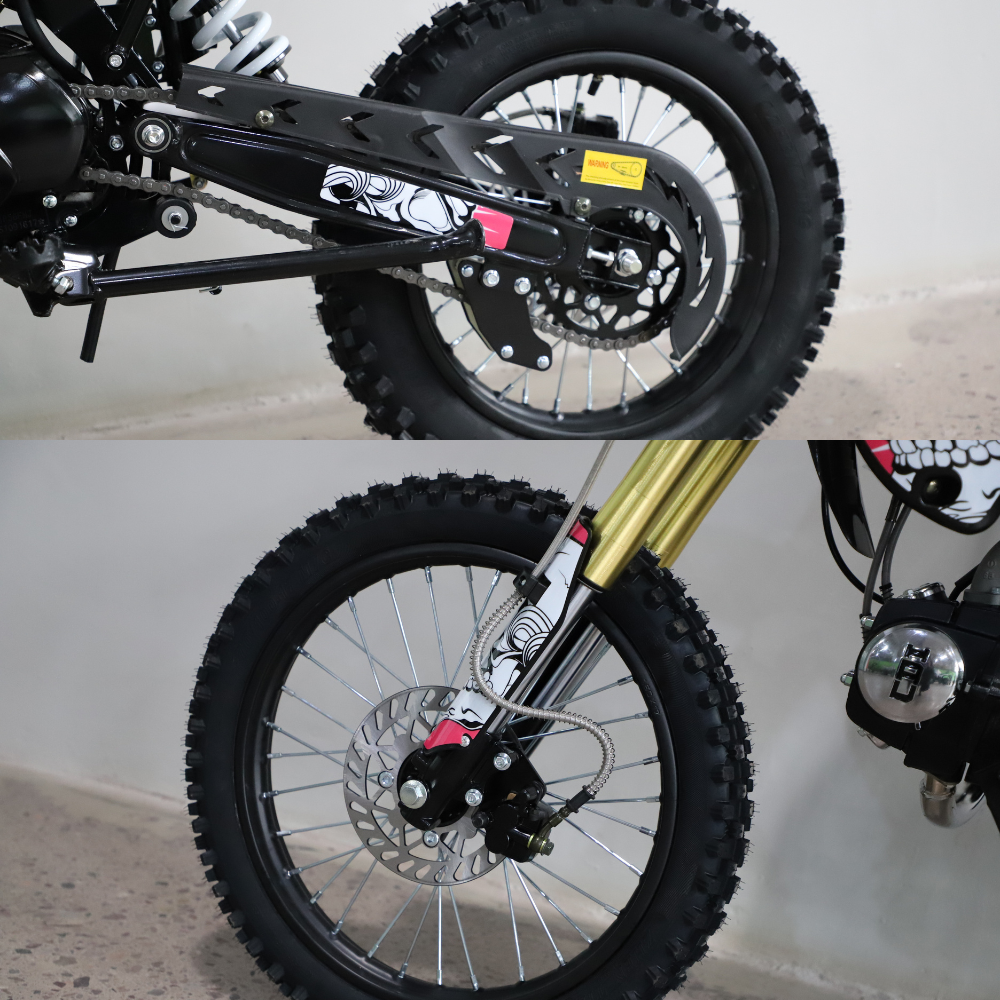 Front and rear tyre close-up, showing disc brakes, spokes, and off-road tread.