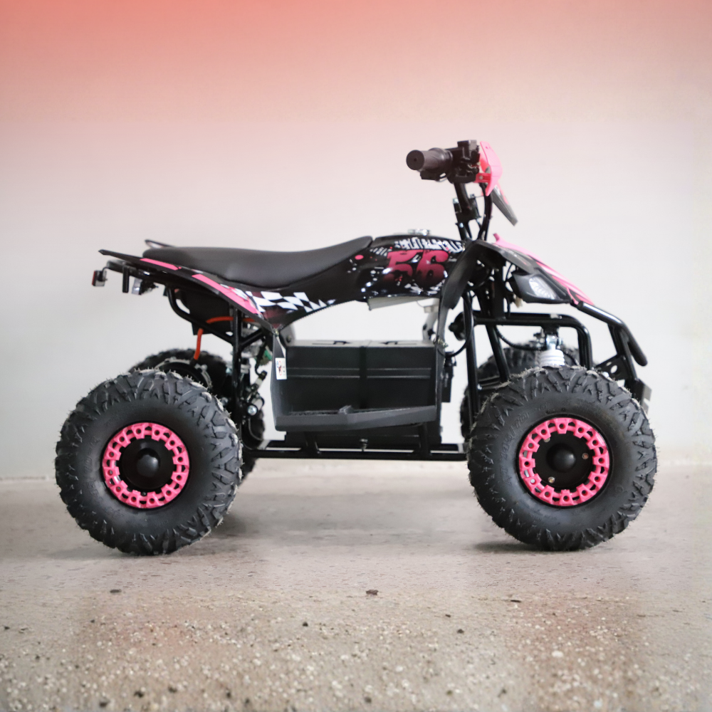 Black and pink ATV on a concrete surface with a gradient background