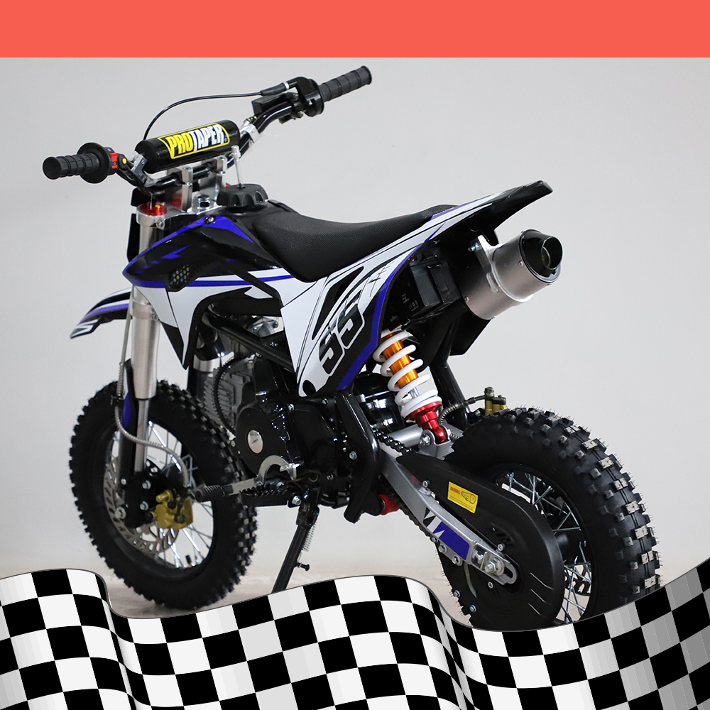 A back-right angled view of the dirt bike, showcasing the exhaust pipe and rear suspension, on a checkered background