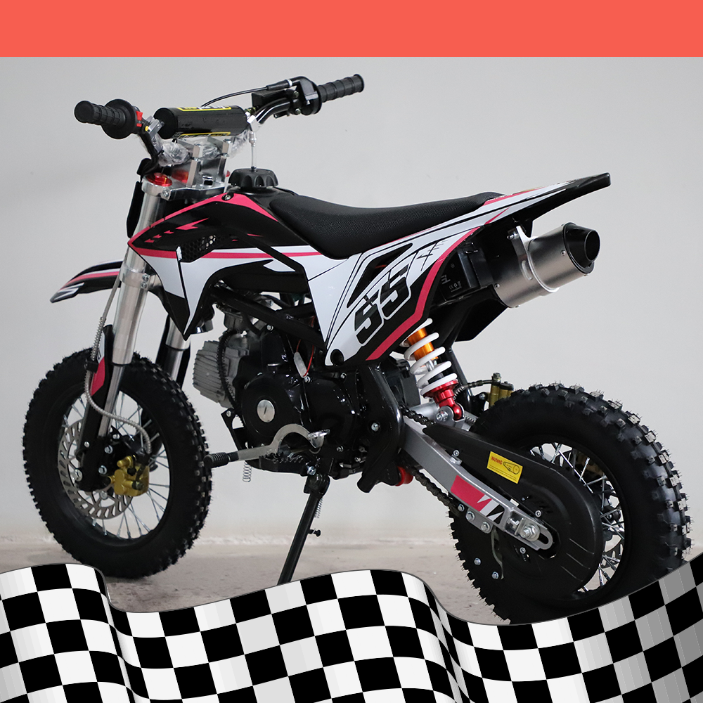 A left-side angled view of the dirt bike displaying the exhaust and rear wheel, with a checkered background.
