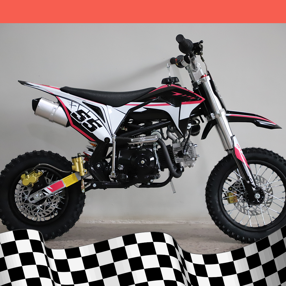 A full right-side view of the dirt bike, highlighting the frame and exhaust system against a checkered base background