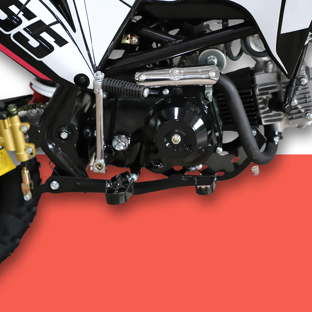 A close-up of the engine and gear assembly, highlighting mechanical details and part of the frame.