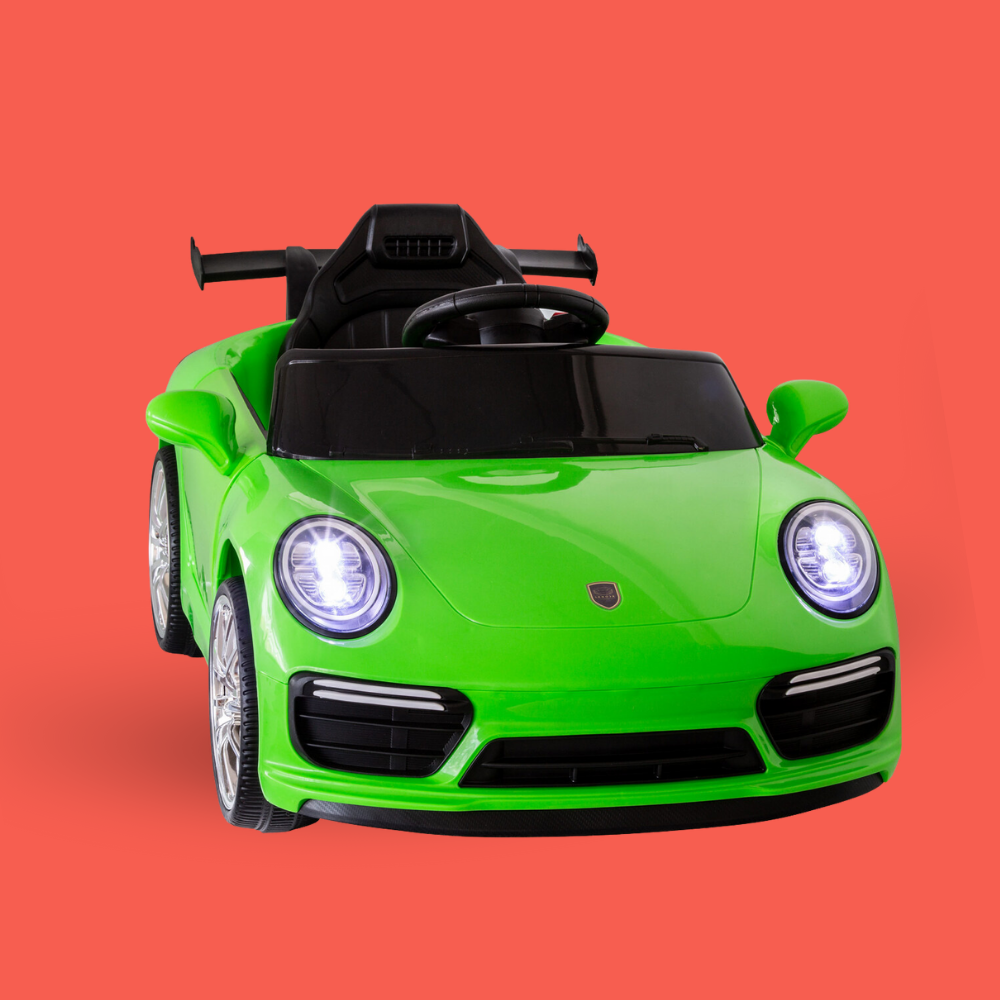 Green toy car with black details on a red background