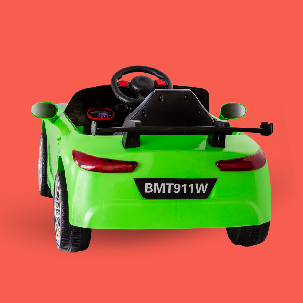 Green toy car with black steering wheel on a red background