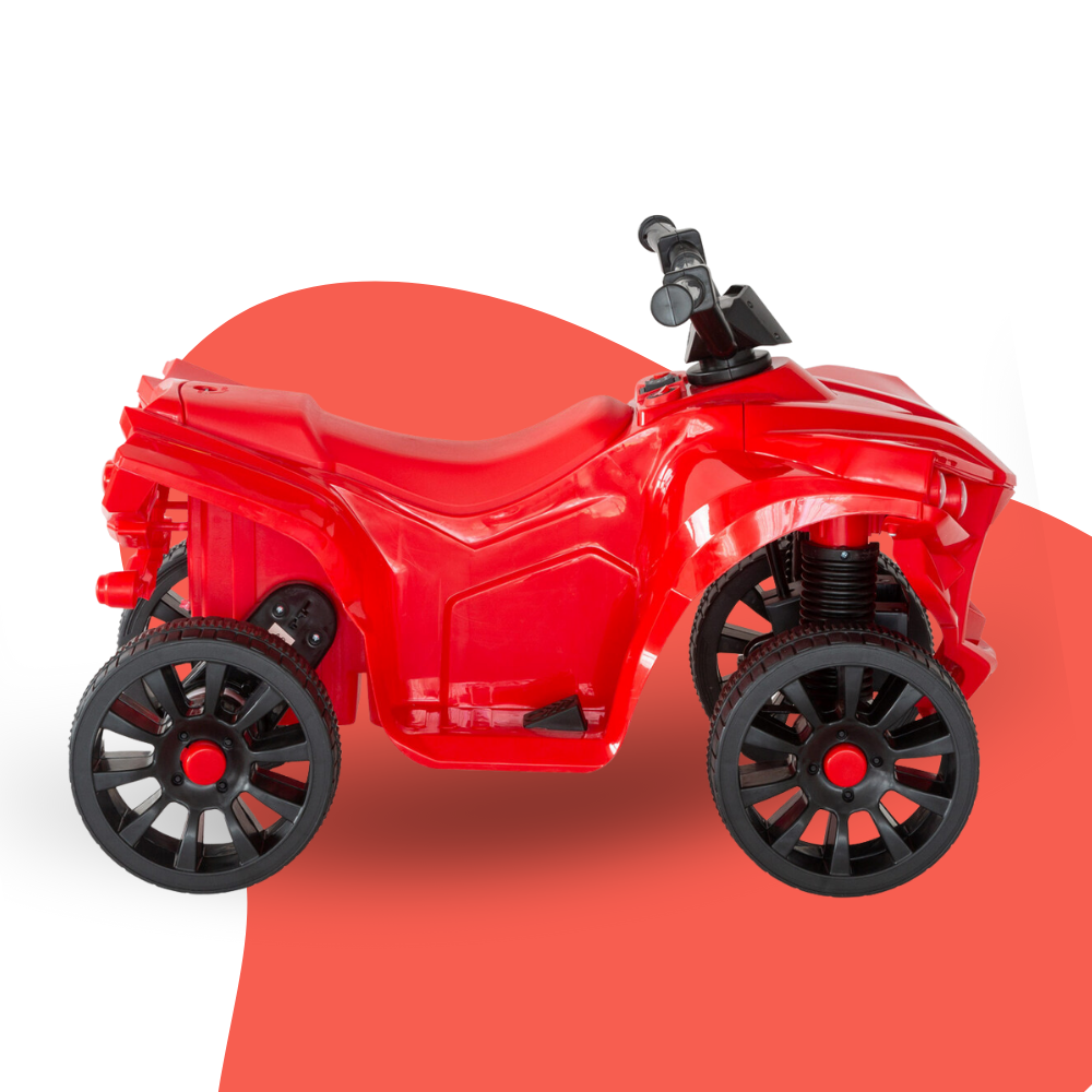 Red toy ATV on a white background