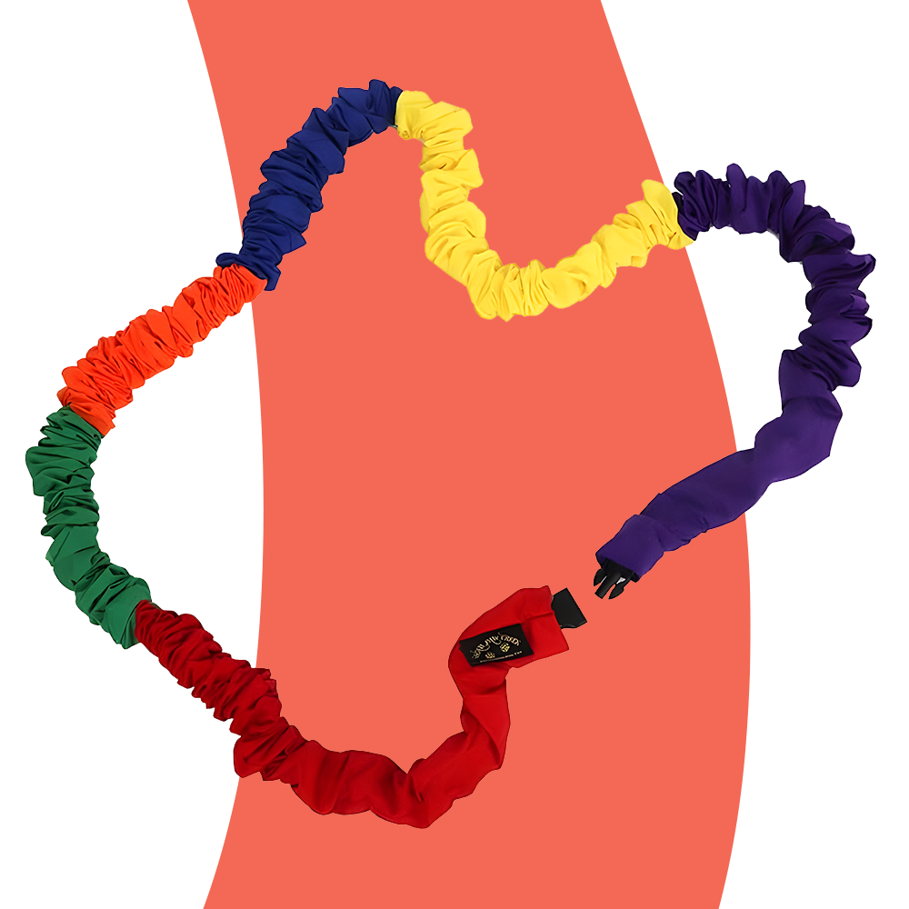 A close-up image of the Soft Stretchy Rainbow Group Loop showing the vibrant colours (red, purple, yellow, green, and orange) arranged in a connected loop