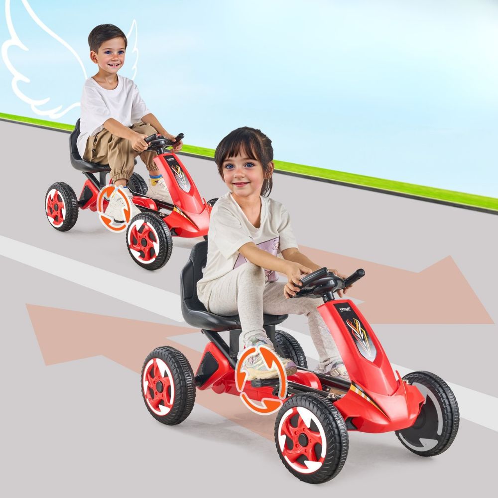 Two children riding red toy cars on a colorful background