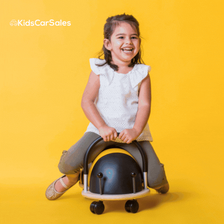 gif animation of a child riding his bee toy in different angles