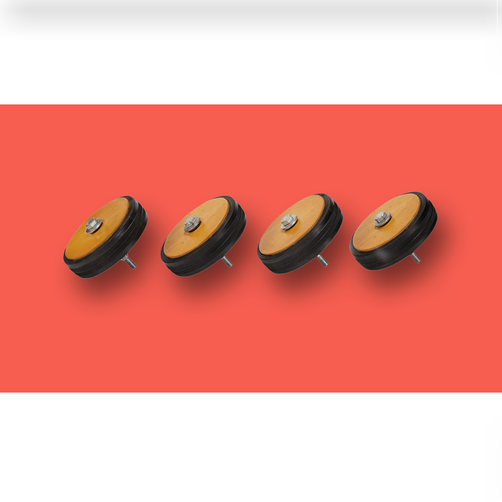 Set of four wheels for the Mega 4 game board on a red background.