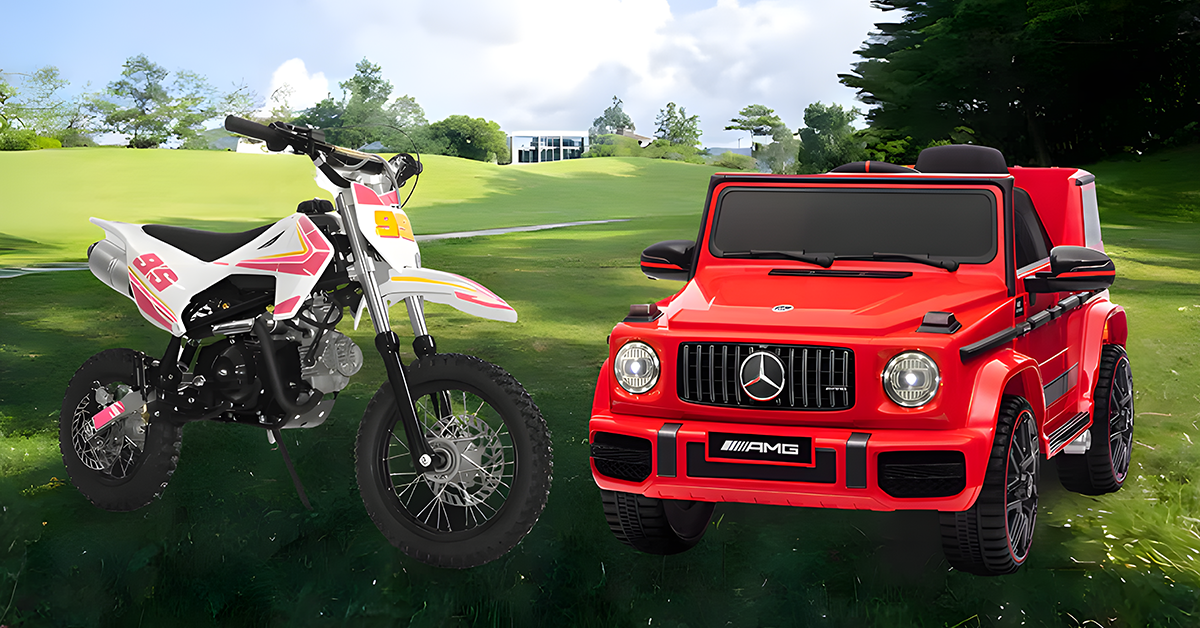 A white dirt bike and a red Mercedes-AMG toy car displayed on a grassy field with trees and a house in the background.