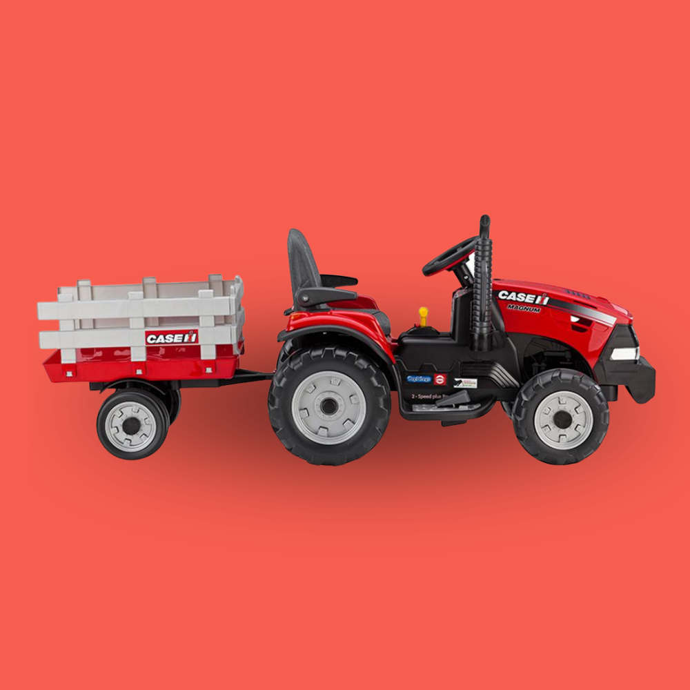 Red toy tractor with a trailer on a red background